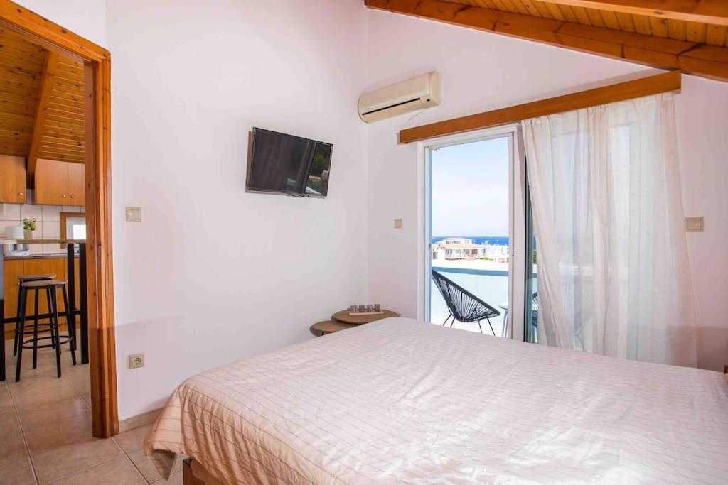 Megat Seaview And Seaside Apartments Ялиссос Экстерьер фото
